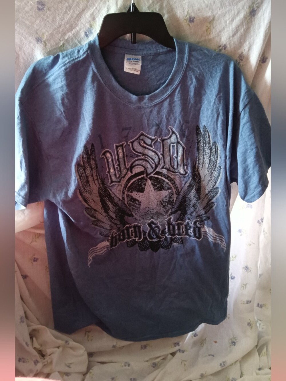 Blue Graphic T-Shirt with Winged Star Design